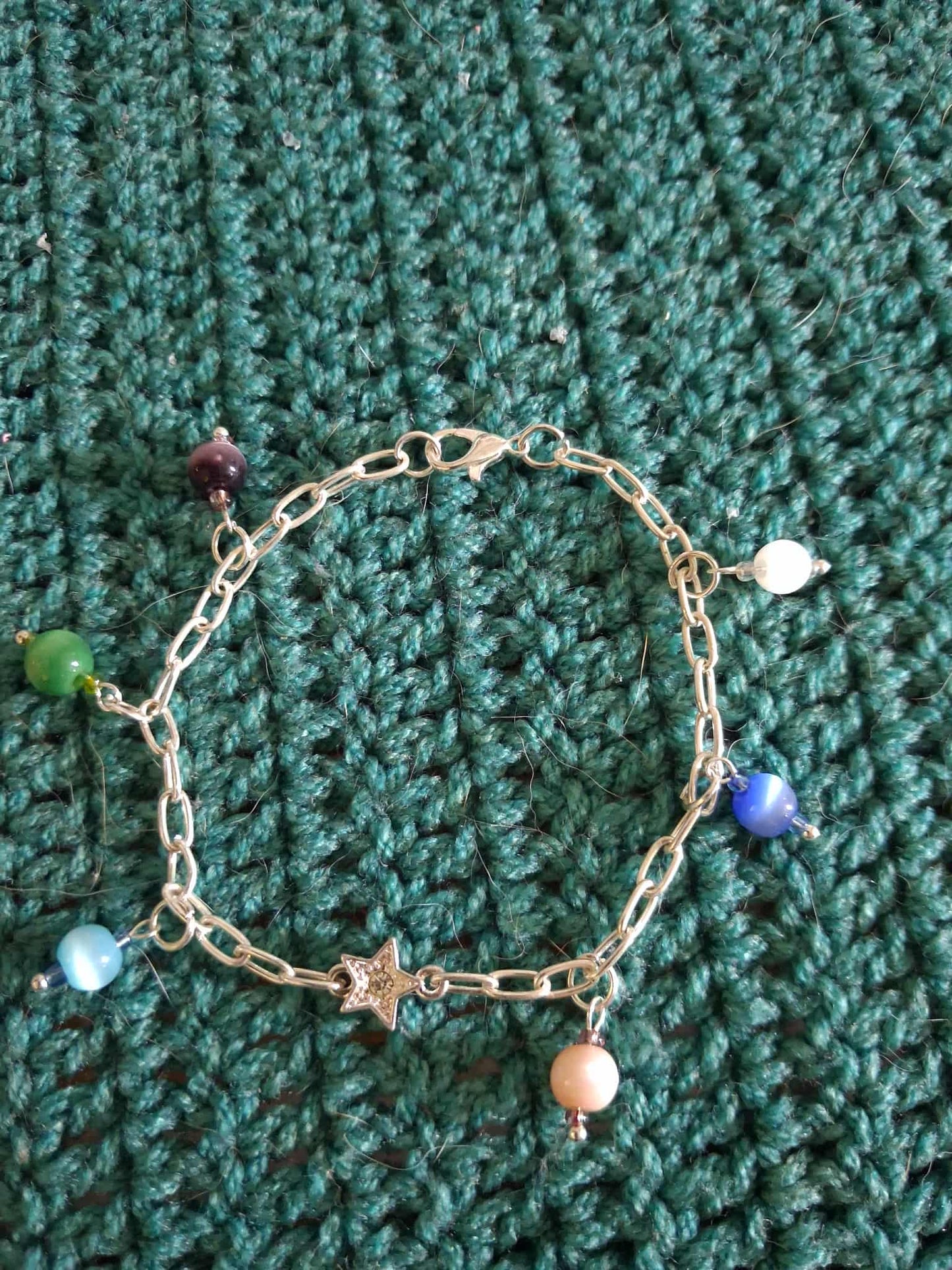 Silver bracelet with cats eye glass colorful beads