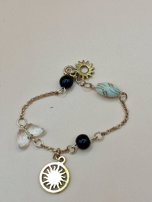 Celestial Sun Charm Bracelet - Vintage Inspired with Black beads & Baroque Resin Beads
