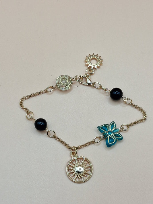 Gold-Toned Celestial Charm Bracelet with Sun Medallions & black Beads